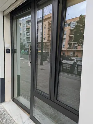 a window in a building looking out at a street at Loft en puerto de Valencia in Valencia