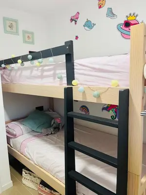 a bunk bed in a childs bedroom at Lugar junto al mar in Casas Las Basas