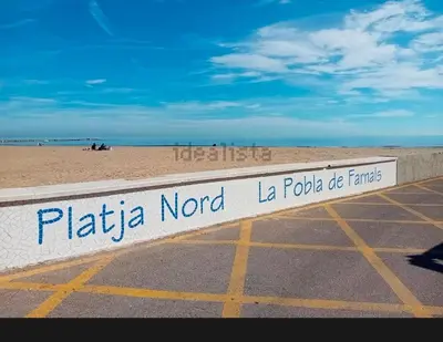 a sign that reads platka nord la polkaise en fermaris at Coqueto apartamento en la playa in Puebla de Farnals