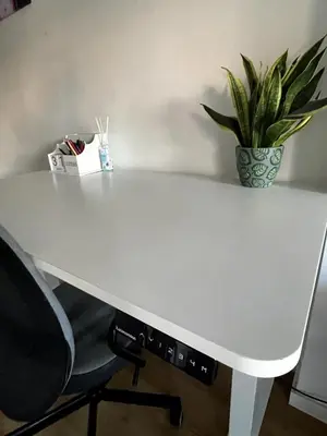 a white desk with a potted plant on it at Casa Calma - Modern Apartment, Perfect Location - All you need for a great time in Valencia in Valencia