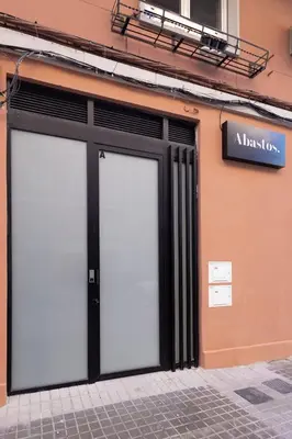 a door of a building with a sign on it at Abastos by Concept Flats in Valencia