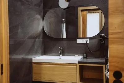 a bathroom with a sink and a mirror at New Loft Rusafa in Valencia