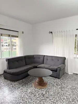 a living room with a couch and a table at Cau de Serra 