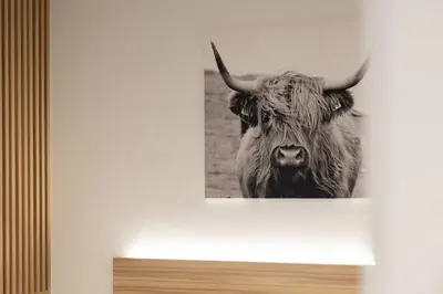 a black and white picture of a cow on a wall at Luxury Apartment Oceanografic 6 pax in Valencia