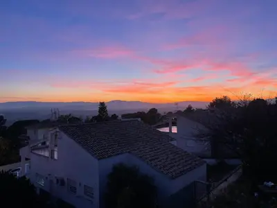a view of a sunset from a house at Valencia, villa, piscina privada, junto A-7 cerca de playas, aeropuerto, Cheste in Torrent