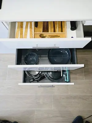 a kitchen cabinet with two plates and a stove at Cozy Retreat in Heart of Valencia Perfect for Couples n Families in Valencia