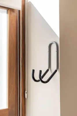 a door handle on a door with a window at Suite Premium junto al Río Turia 1 in Valencia
