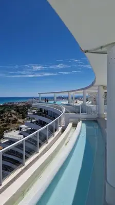 a view of a swimming pool on a cruise ship at Appartement avec vue piscine in Canet de Berenguer
