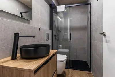 a bathroom with a sink and a shower at Premium Suite by the Turia River 4 in Valencia