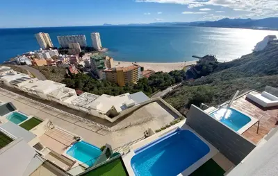 a view of a city and the ocean from a house at 3 Bedroom Beautiful Home In Cullera in Cullera