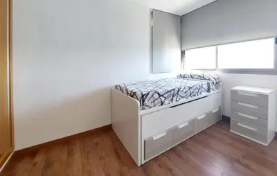 a small bedroom with a bed and a window at 3 Bedroom Beautiful Home In Cullera in Cullera