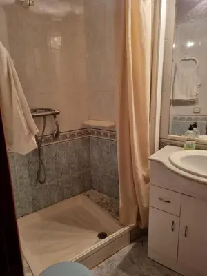a bathroom with a shower and a sink at Casa Amando in Chulilla