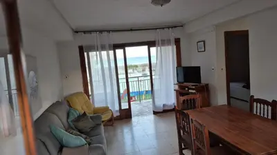 a living room with a couch and a table at CANET de BERENGUER in Canet de Berenguer