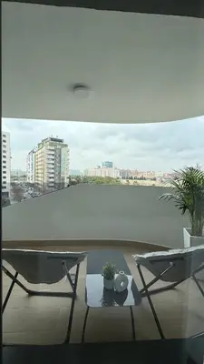 a balcony with a table and a view of the water at Apartamento Luxury in Valencia