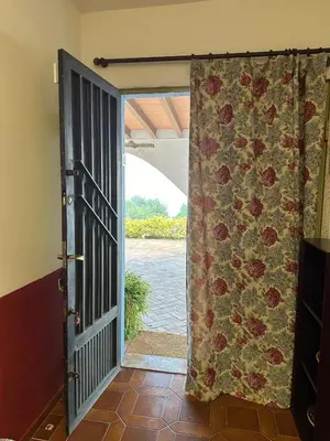 an open door with a view of the water at El mirador de la Sonora in Artana
