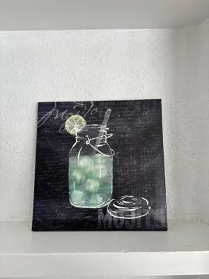 a painting of a glass jar with a lime in it at Casa Lúmina Laura-Valencia in Valencia