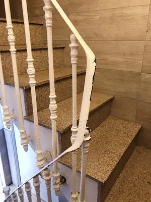 a white ribbon on the stairs of a building at Apartamentos Mercat in Valencia