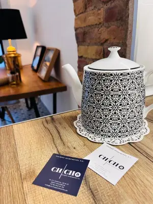 a table with a pot on top of a table at Family Sea & Home Cabanyal in Valencia