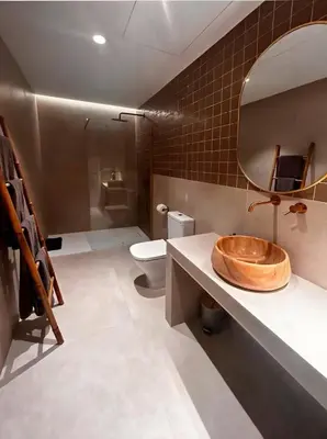 a bathroom with a wooden sink and a toilet at Pivote Flats-Playa B in Valencia