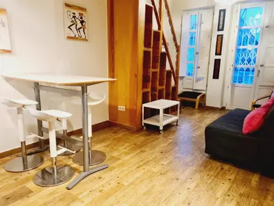 a living room with a table and a couch at Padre Luis flat in Valencia