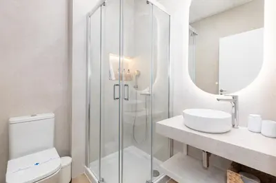 a bathroom with a shower and a toilet and a sink at Ca La Leni Beach 0 in Valencia