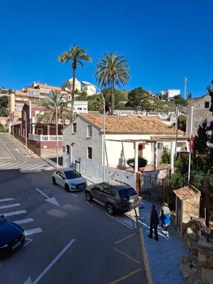 an aerial view of a street with cars and buildings at Faro Playa de Cullera in Faro de Cullera