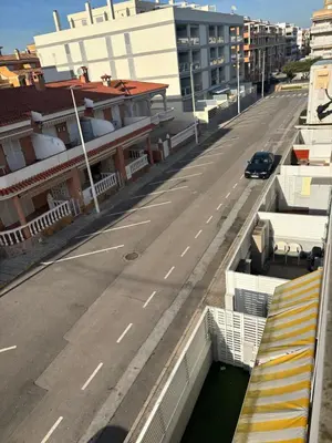 an empty street in a city with buildings at Wohnung in Moncófar