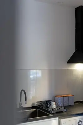 a kitchen with a sink and a stove top oven at Alojamiento, hospedaje para 6 personas in Valencia