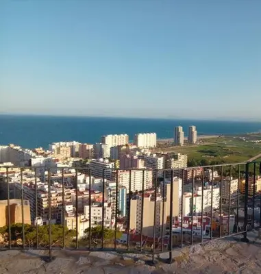 a view of a city with buildings and the ocean at Medusa Felix in Cullera