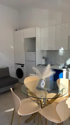 a bathroom with a sink and a mirror at MAGNO- Beach in Valencia