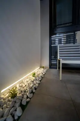 a room with a bench and a bunch of rocks at Accommodation for 4 people in Valencia