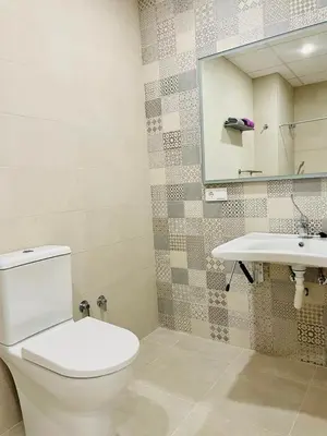 a bathroom with a toilet and a sink at Plus Ultra Ruzafa 6 in Valencia