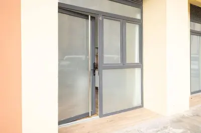 an open sliding glass door on a building at Flats Uruguay in Valencia