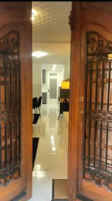 an open door to a room with a hallway at Stylish and renovated house in Cullera