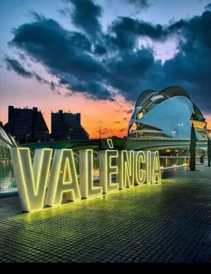 a large sign that says varne agency in front of a city at Habitacion cerca a Ciudad de las Artes y las Ciencias in Valencia