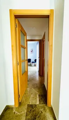 an open door into a room with a hallway at ABAT 2 Cool & Wide Flat next to the Cathedral in Valencia