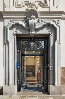 an ornate doorway to a building with a staircase at One Shot Puerta Ruzafa in Valencia