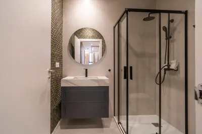 a bathroom with a sink and a shower at VLC HOST - Palleter in Valencia