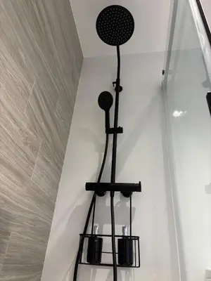a black chandelier hanging from a ceiling at Apartamento en Valencia Ruzafa in Valencia