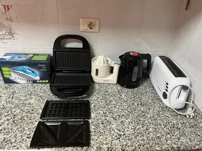 a counter top with a blender and other kitchen appliances at Apartament Marina Cullera in Cullera