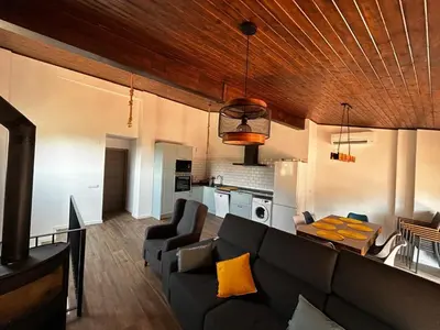 a living room with a couch and a table at Vistas del Frailecico in Chulilla