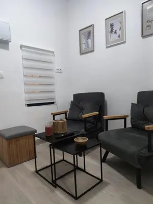 a living room with a couch and a coffee table at La Casita de Cullera in Cullera