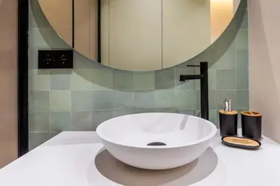 a white sink on a counter in a bathroom at Lujoso apartamento en Ruzafa in Valencia