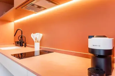 a kitchen with a coffee maker on a counter at Lujoso apartamento en Ruzafa in Valencia