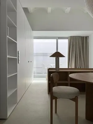 a room with a desk and a chair and a window at Superloft in Burjasot