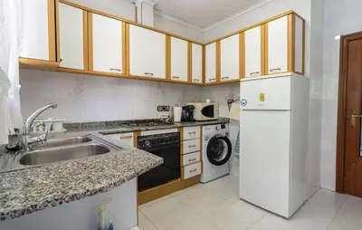 a kitchen with a sink and a dishwasher at 2 Bedroom Lovely Apartment In Sagunto in Sagunto