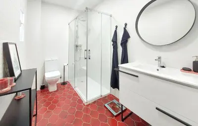 a bathroom with a toilet and a sink and a mirror at Gorgeous Home In Llaurí With Wifi in Llaurí