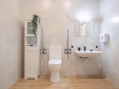 a bathroom with a toilet and a sink at Winahost Apartamento Benimaclet 1 in Valencia