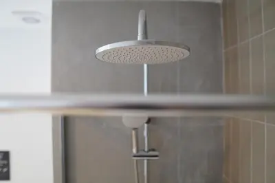 a kitchen sink with a light hanging over it at Céntrico & Lujoso in Valencia