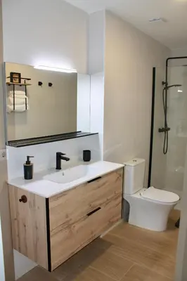 a bathroom with a sink and a toilet at Maresia Zarco in Valencia